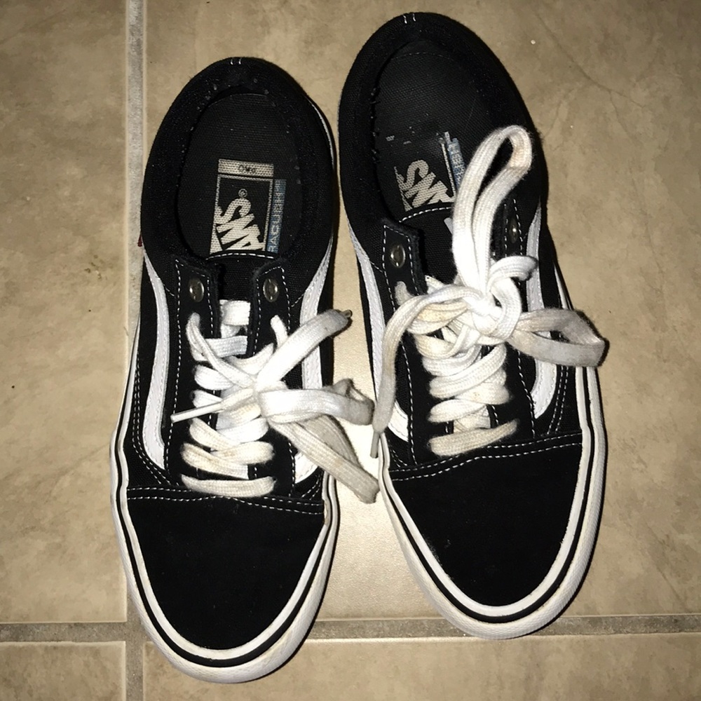 Black and white old Skool vans